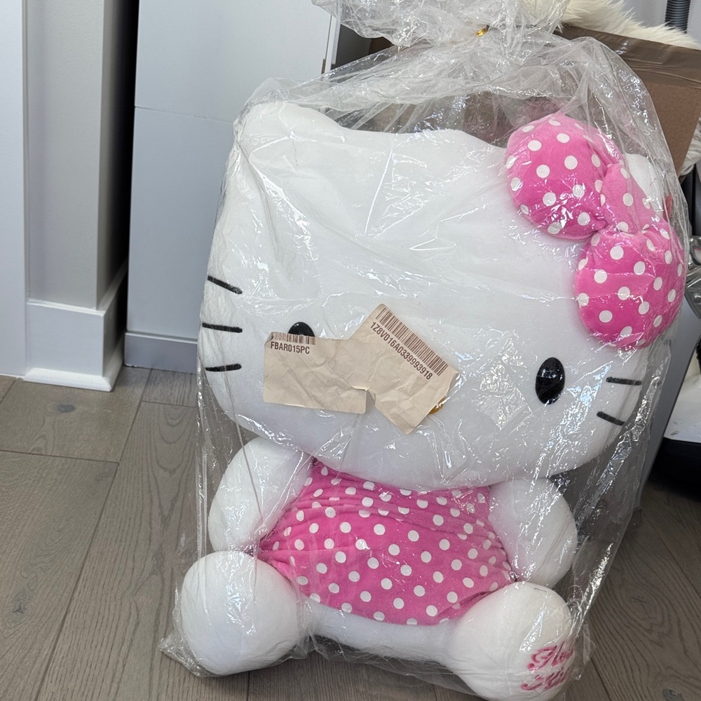 Sanrio Hello Kitty 24” jumbo imported White and Pink polka dot Stuffed Animal